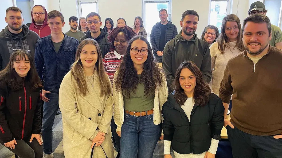 adult students pose after a Study Skills Q&A with former SWAP students
