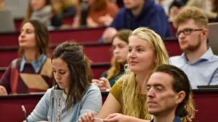 students sit in a lecture theatre at the University of Aberdeen