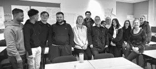 A black and white photo of Louise and her SWAP class.